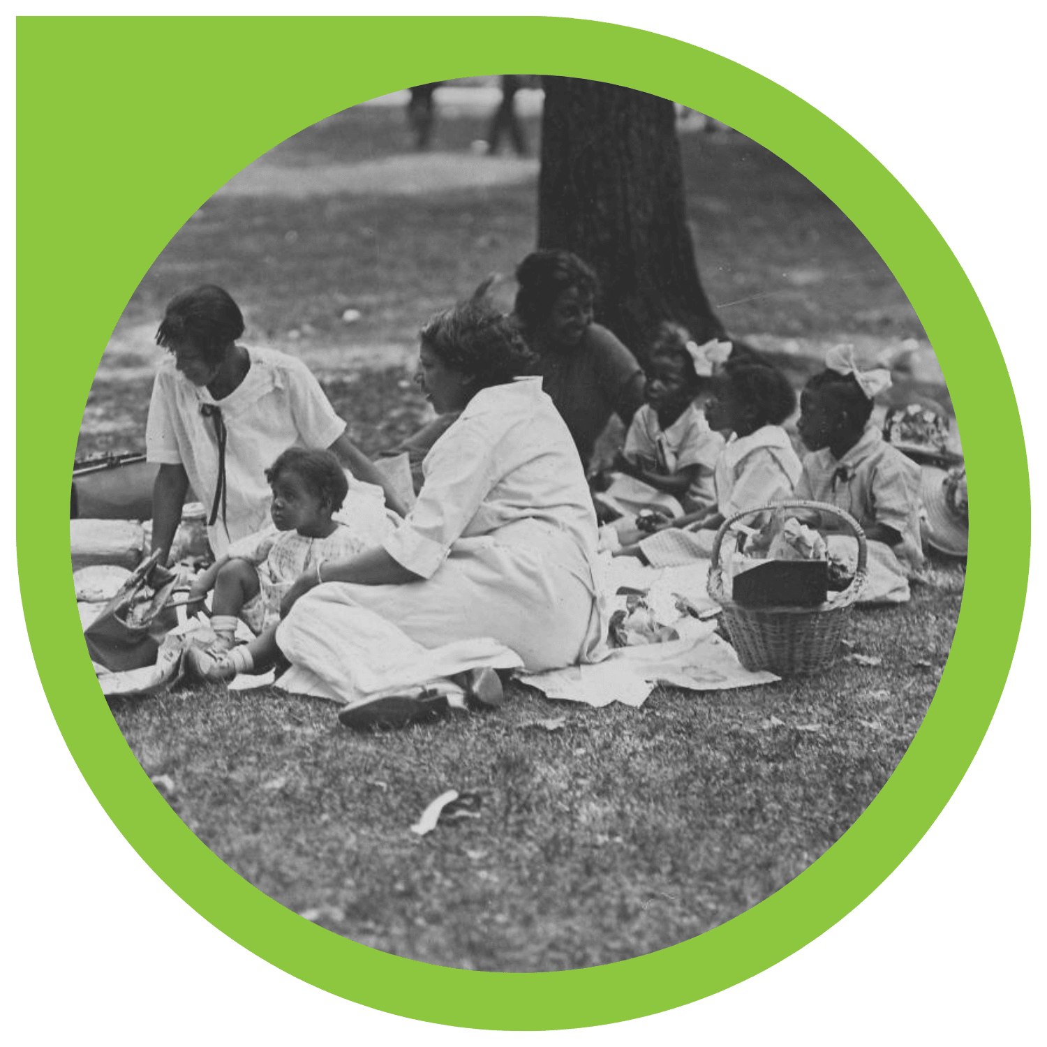 a black & white image of Black people having a park picnic, outlined in a round green bubble